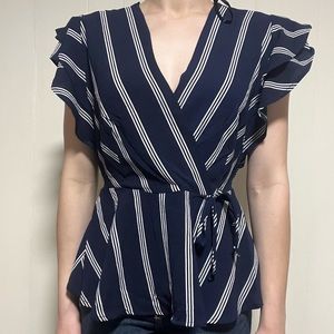 Navy blue and white striped v neck blouse